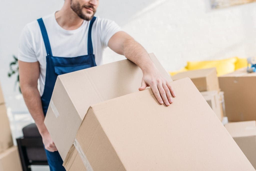 Professional mover moving boxes