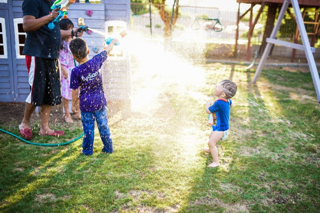 House hunting tips for parents.  Kids playing in back yard