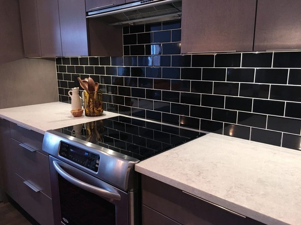 Kitchen backsplash in black subway tiles