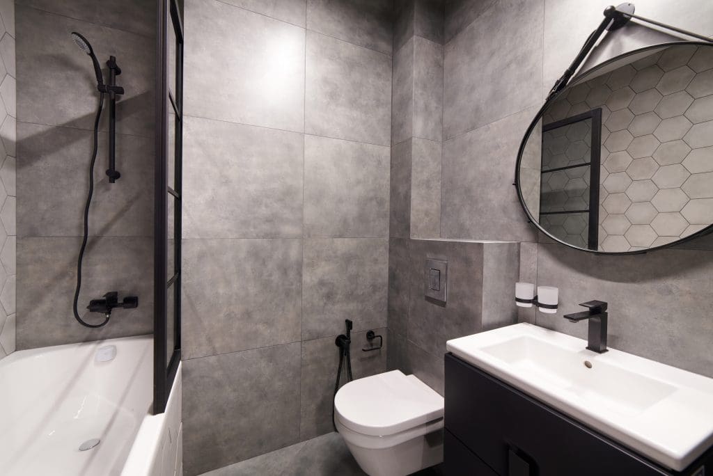 Modern bathroom with stone tile walls