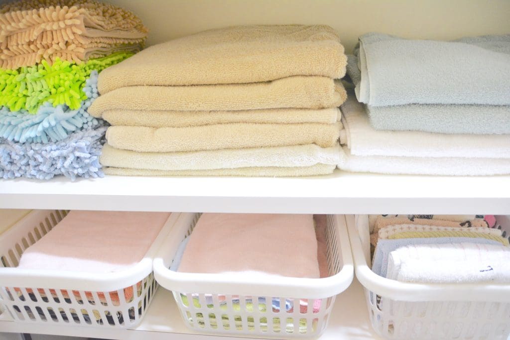 Bath towels organized in baskets