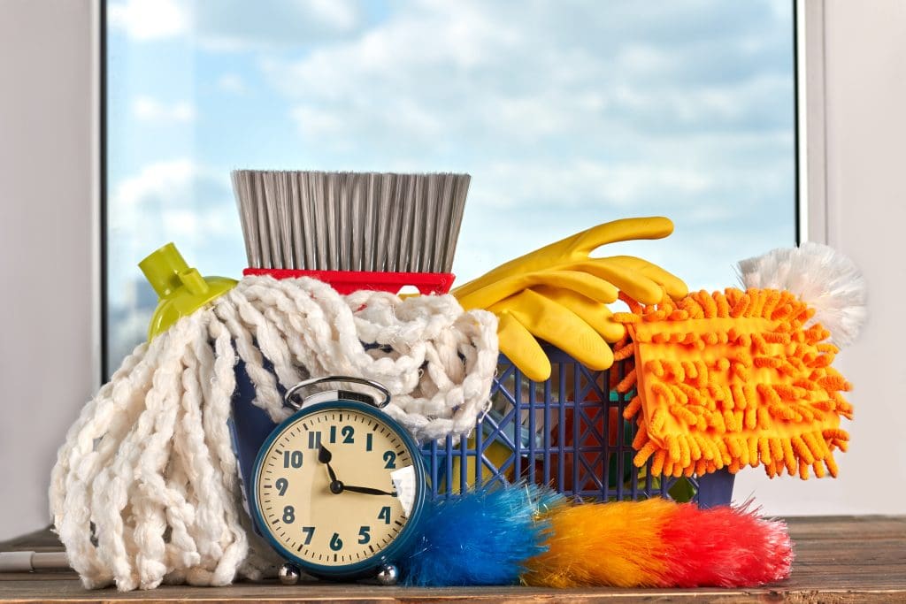 6 Ways to Organize Your Home for a Stress-Free Lifestyle.  Cleaning time with cleaning supplies. 