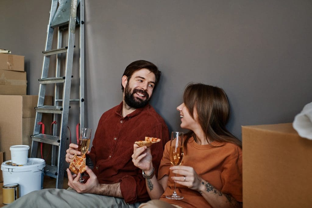 Couple celebrating closing on a new home