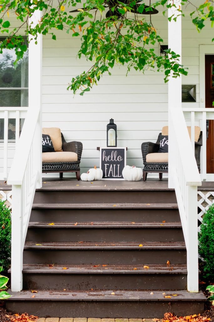 front porch decorated for fall. 