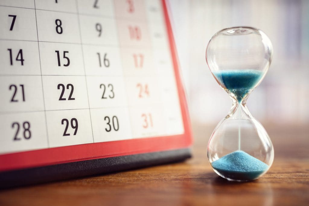 Hour glass and calendar concept of flexibility 