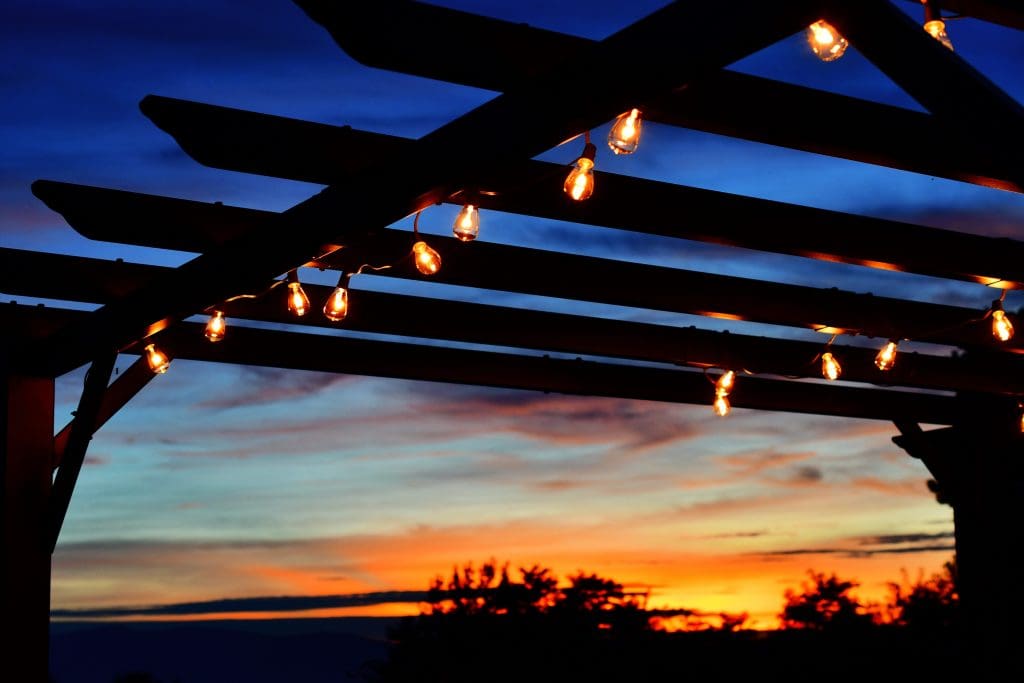 How to Create Your Perfect Outdoor Living Oasis.  Concept of outdoor lighting
