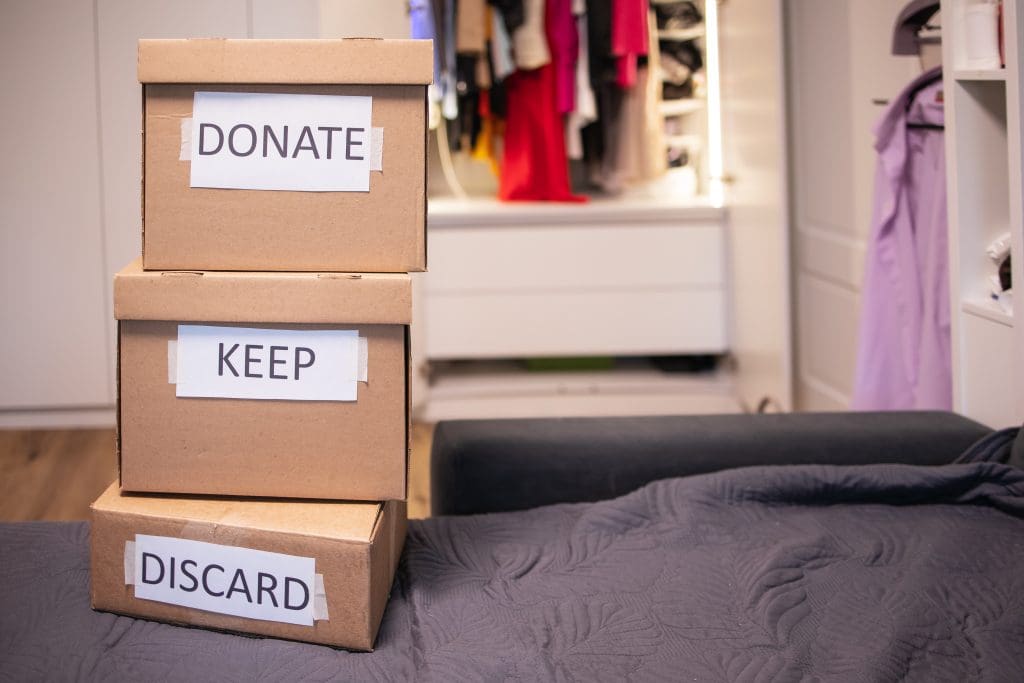 6 Ways to Organize Your Home for a Stress-Free Lifestyle.  Donte, Keep and Discard boxes for de-cluttering. 