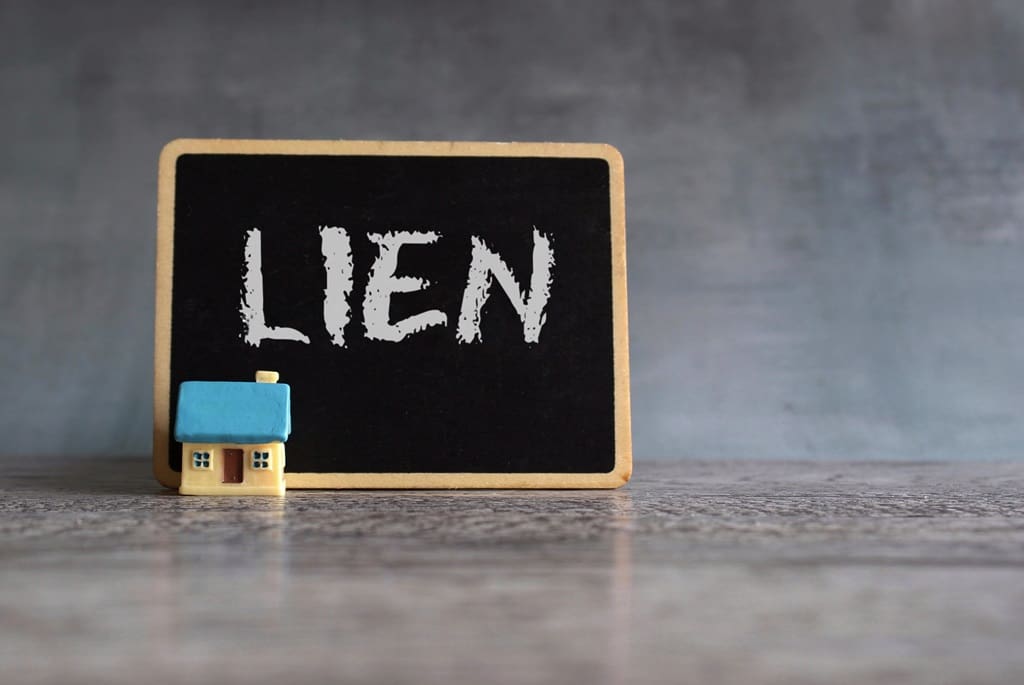 Selling Your Home with a Lien:  Expert Advice for Sellers