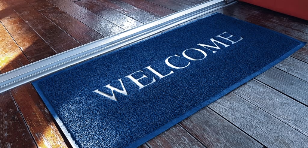 5 Cheap and Easy Ways to Boost Your Home's Curb Appeal:  Welcome Mat